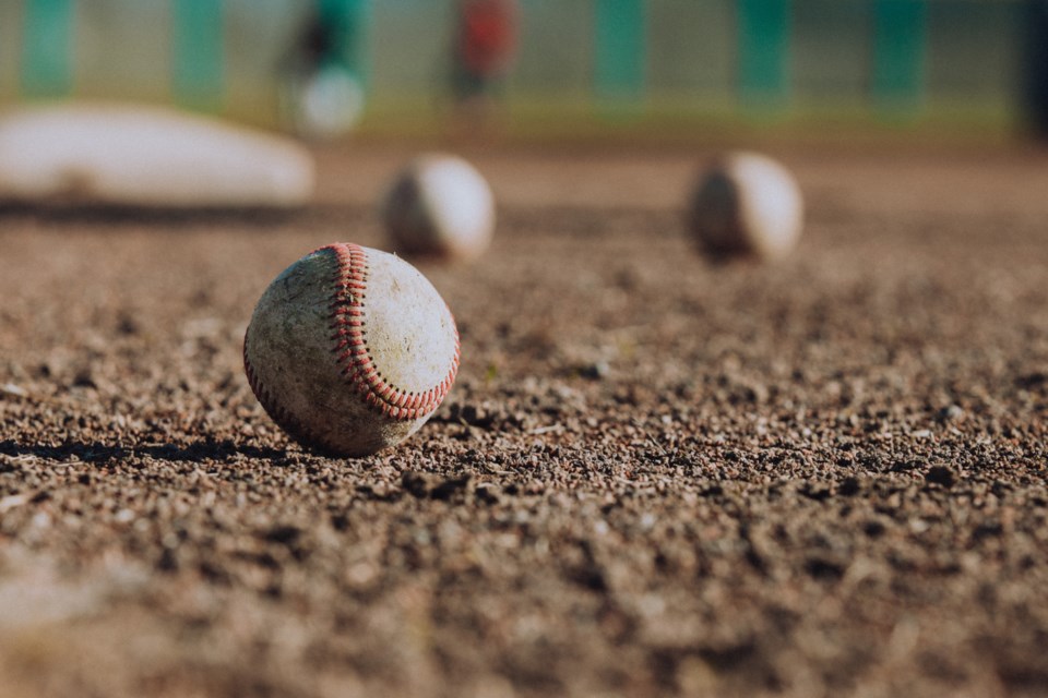 mike-bowman-Baseballs on the ground-unsplash